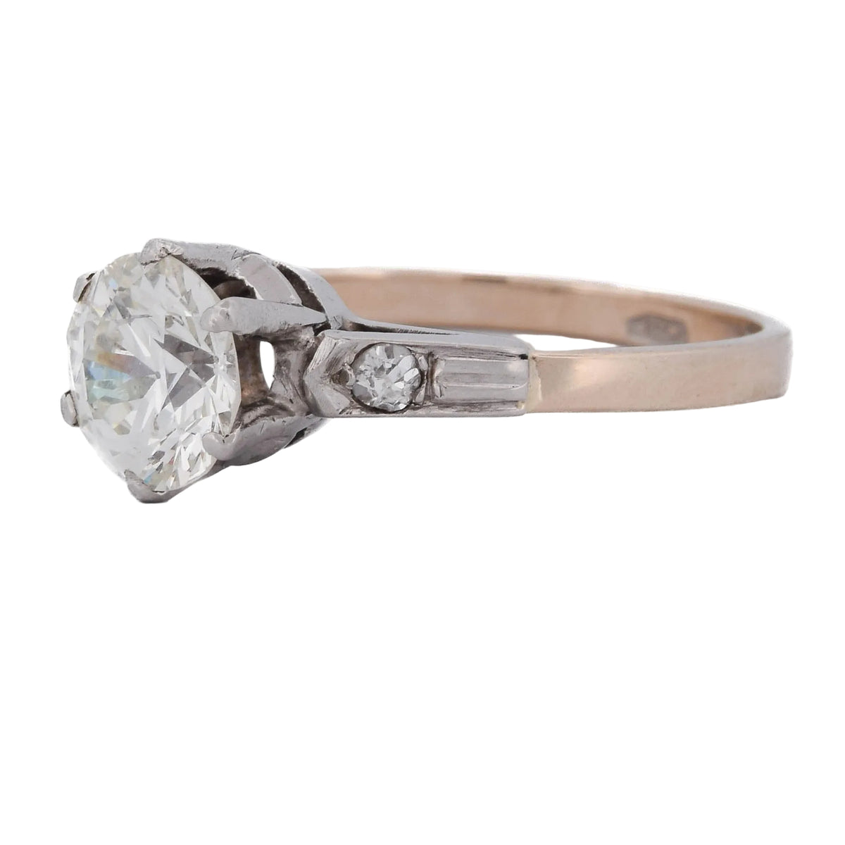 Bague Solitaire en or rose, platine et diamants