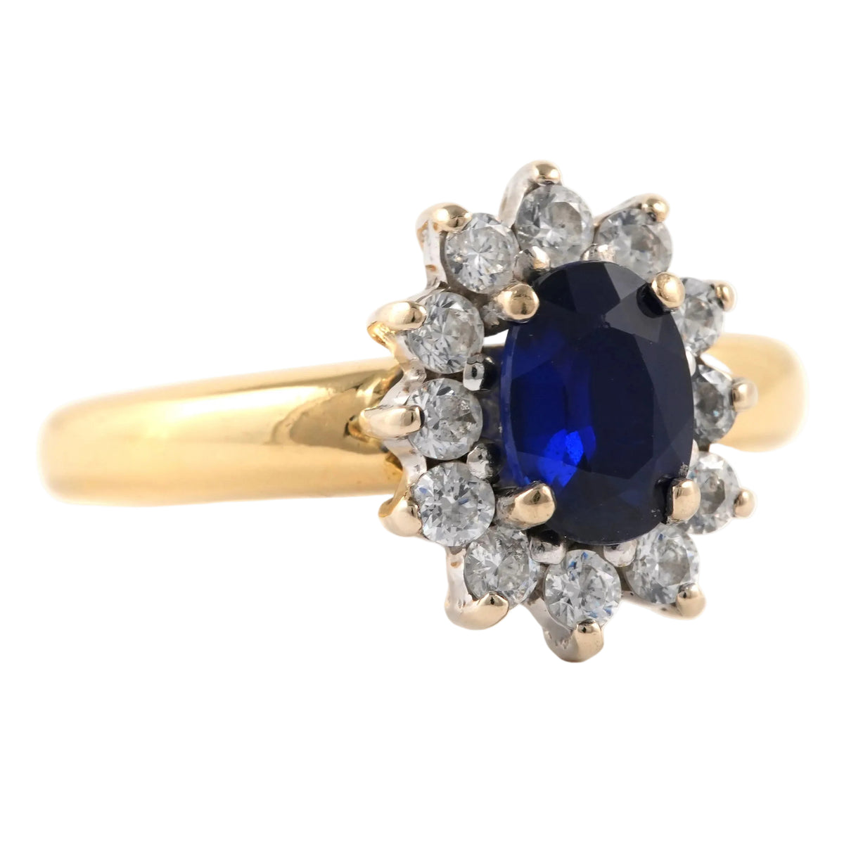Bague Entourage en or jaune, saphir et zirconiums