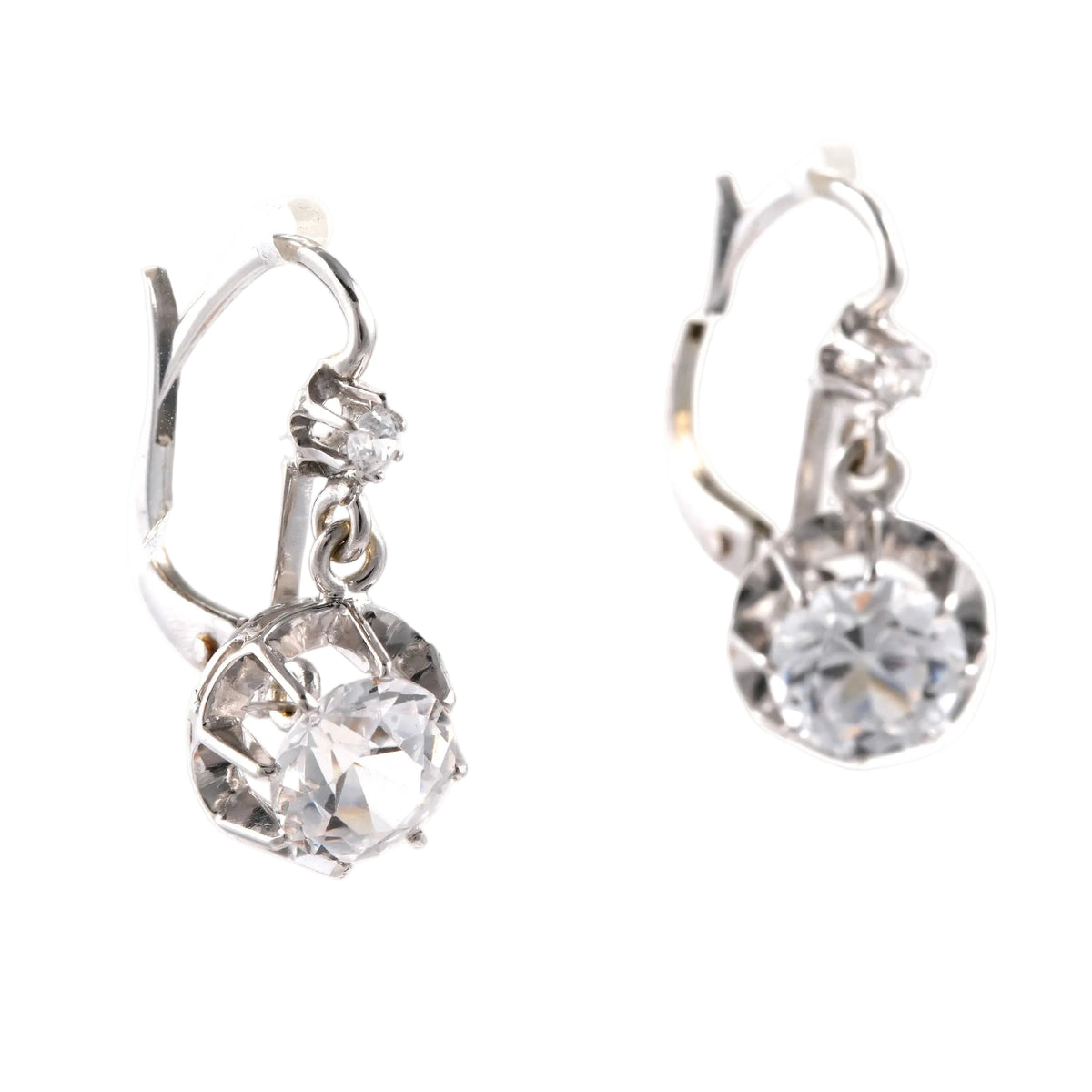 Boucles d'oreilles Dormeuses en or blanc et zirconiums