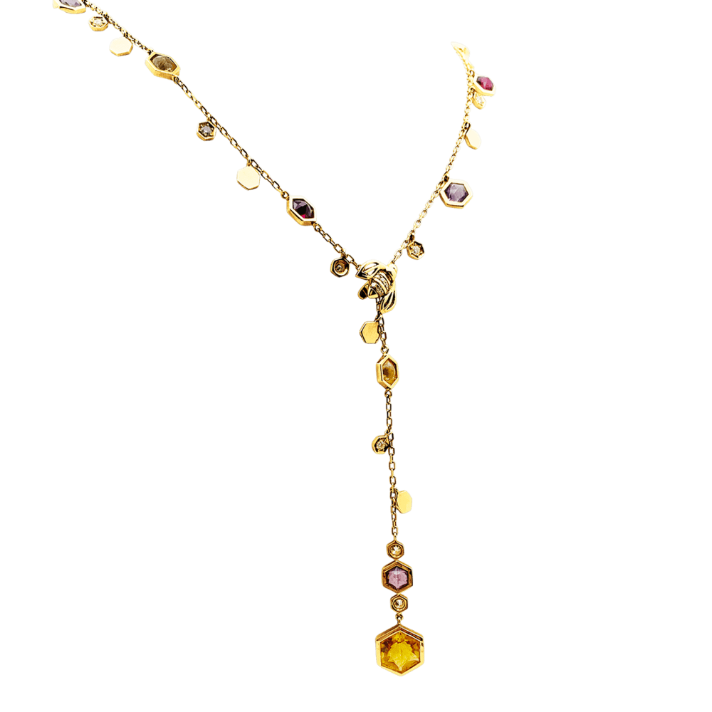 Collier Cravate PIAGET "Magic Garden Limelight" en or jaune, améthystes, citrines, grenats et diamants - Castafiore