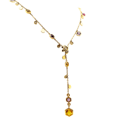 Collier Cravate PIAGET "Magic Garden Limelight" en or jaune, améthystes, citrines, grenats et diamants - Castafiore