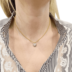 Collier deux ors, diamant. - Castafiore