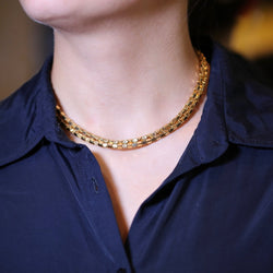 Collier en or jaune 18K à deux rangs, signé MELLERIO. - Castafiore