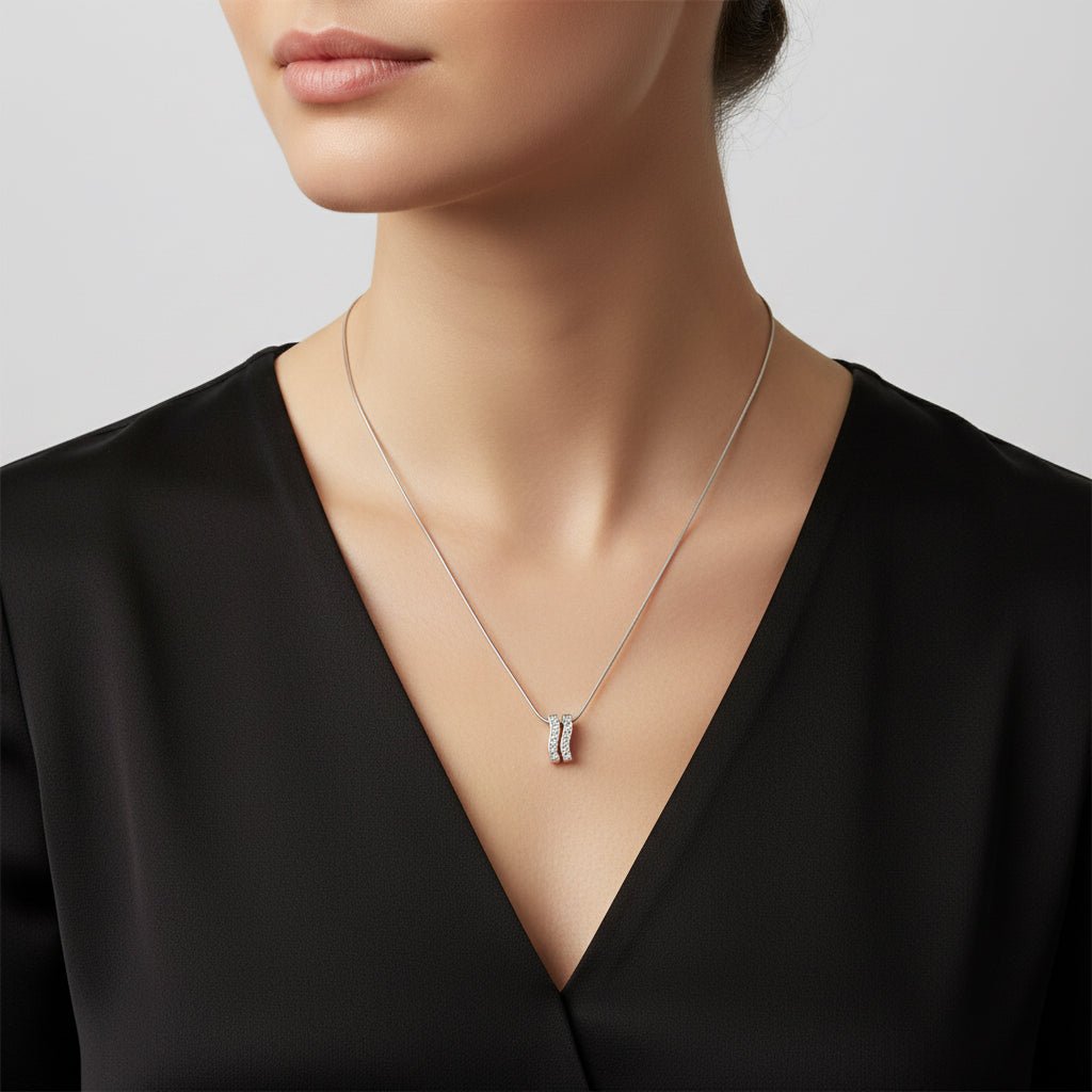 Collier Louis FERAUD en or blanc et diamants - Castafiore