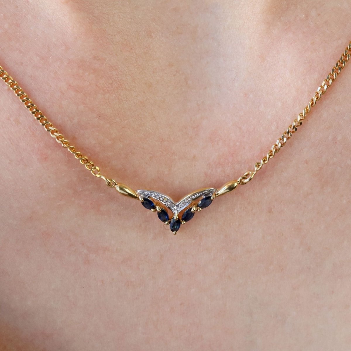 Collier maille gourmette en or jaune et saphirs navette diamants - Castafiore