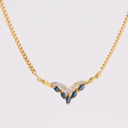 Collier maille gourmette en or jaune et saphirs navette diamants - Castafiore