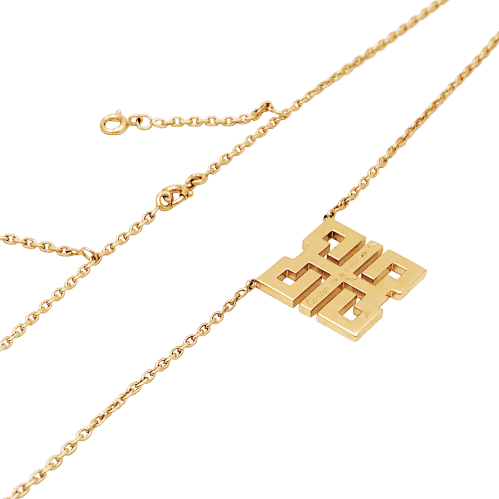 Collier Pendentif CARTIER "Baiser du Dragon" en or jaune et diamants - Castafiore