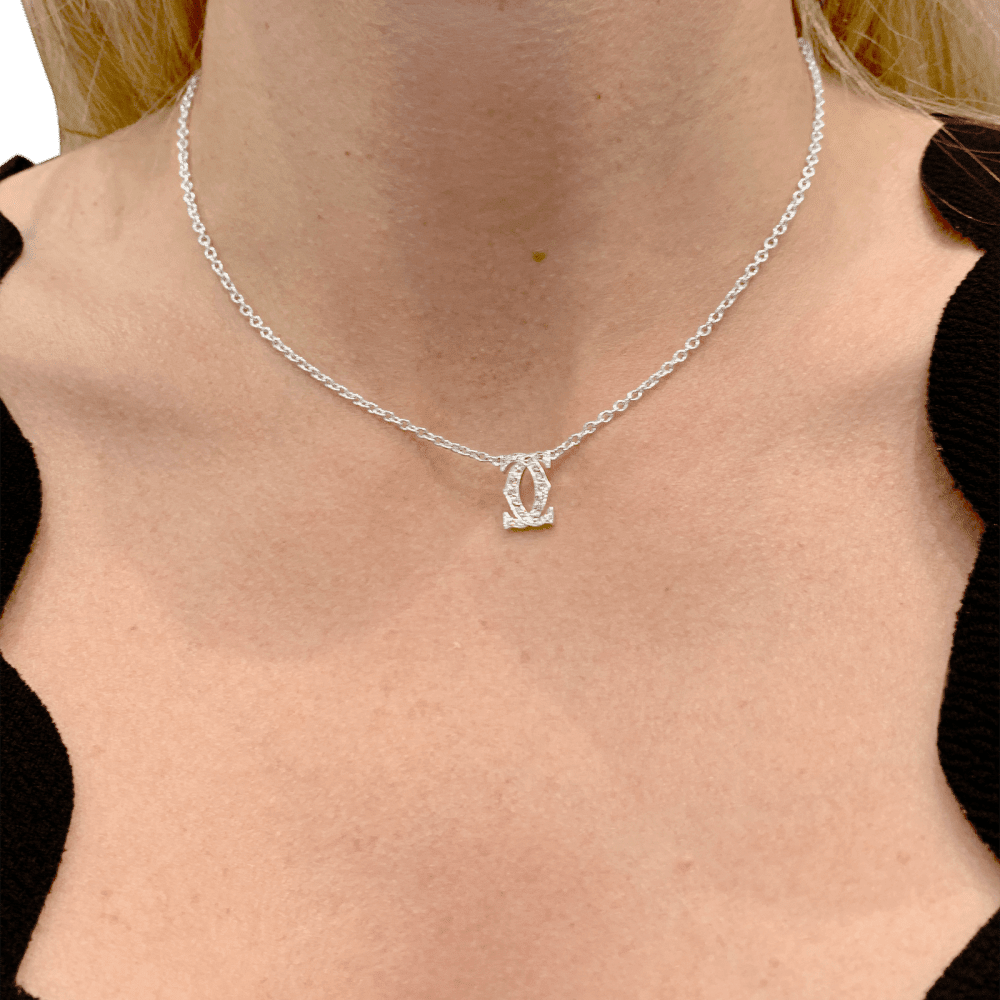 Collier Pendentif CARTIER "Double C" en or blanc et diamants - Castafiore