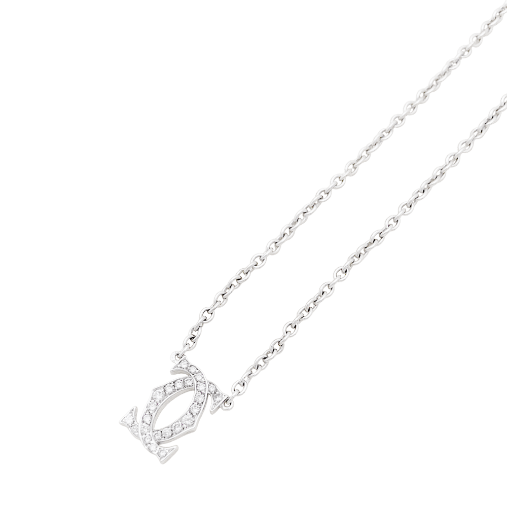 Collier Pendentif CARTIER "Double C" en or blanc et diamants - Castafiore