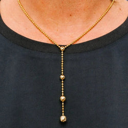 Collier Pendentif CARTIER "Draperie de décolleté" en or jaune et diamants - Castafiore