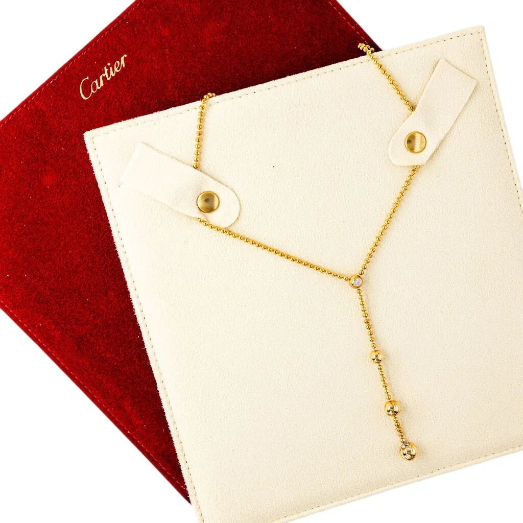 Collier Pendentif CARTIER "Draperie de décolleté" en or jaune et diamants - Castafiore