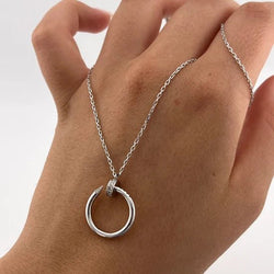 Collier Pendentif CARTIER "Just un Clou" en or blanc et diamants - Castafiore
