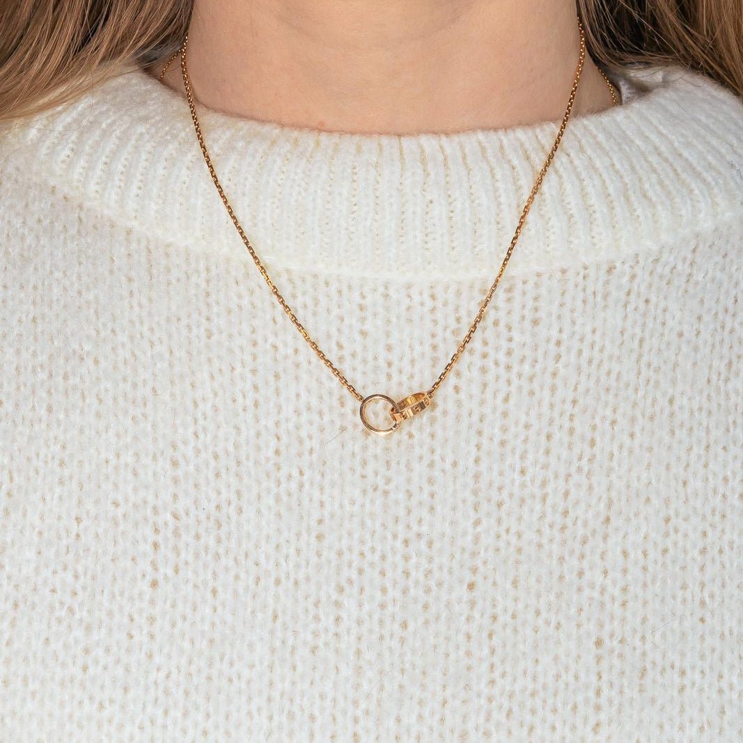 Collier Pendentif CARTIER "Love" en or rose et diamants - Castafiore