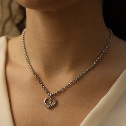 Collier Pendentif CHOPARD "Happy Diamonds" en or blanc et diamants - Castafiore