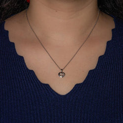 Collier Pendentif CHOPARD "Happy Heart" en or blanc et diamant - Castafiore