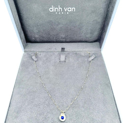 Collier Pendentif DINH VAN "Menottes R10" en or jaune et lapis lazuli - Castafiore