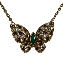 Collier Pendentif FRED "Papillon articulé" en or jaune, rubis, émeraude et diamants - Castafiore