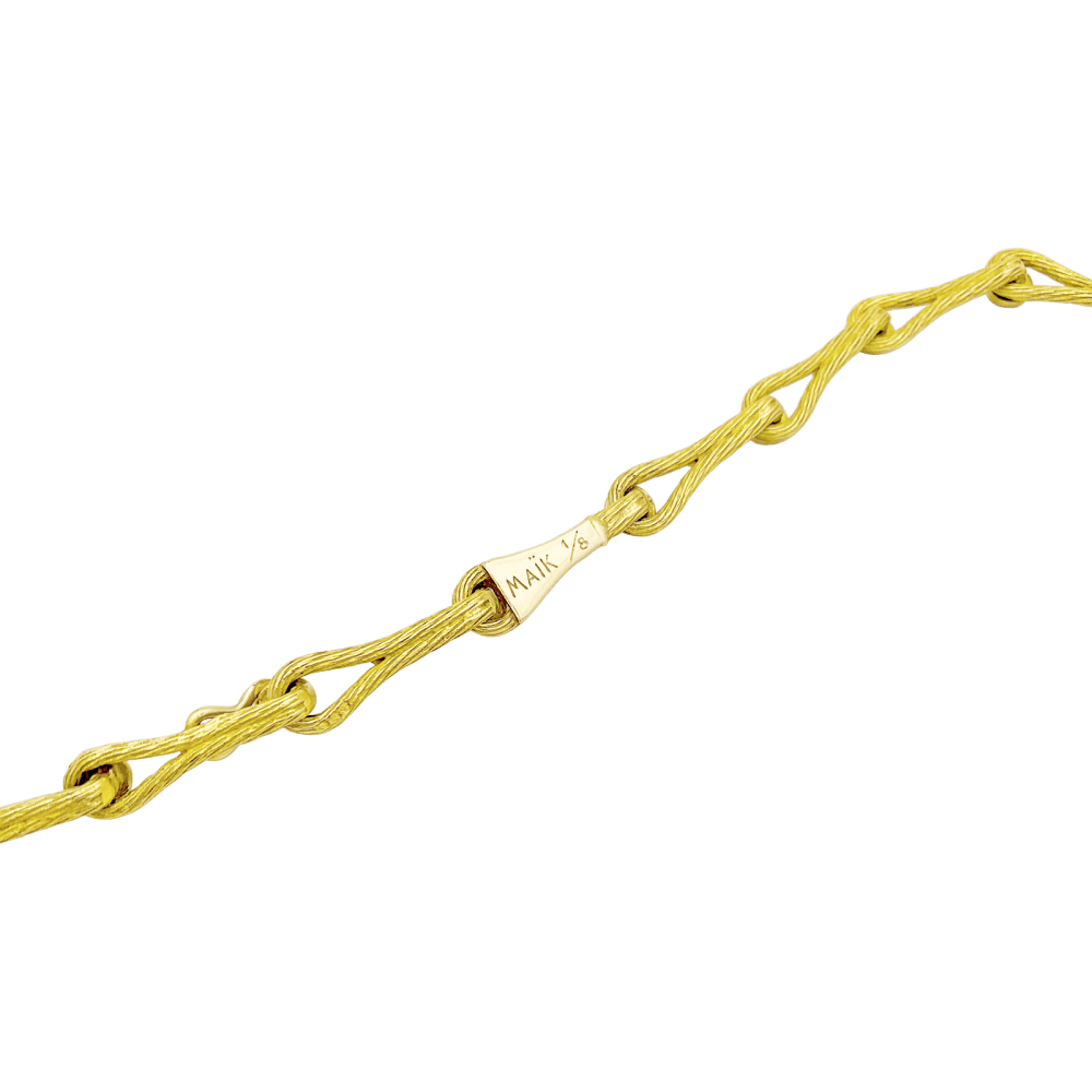 Collier Pendentif HENRI HECHT MAÏK "Le clown et le lion" en or jaune, émail, rubis et émeraudes - Castafiore