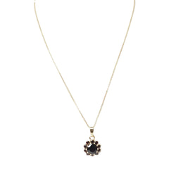 Collier pendentif marguerite en or jaune et grenats - Castafiore