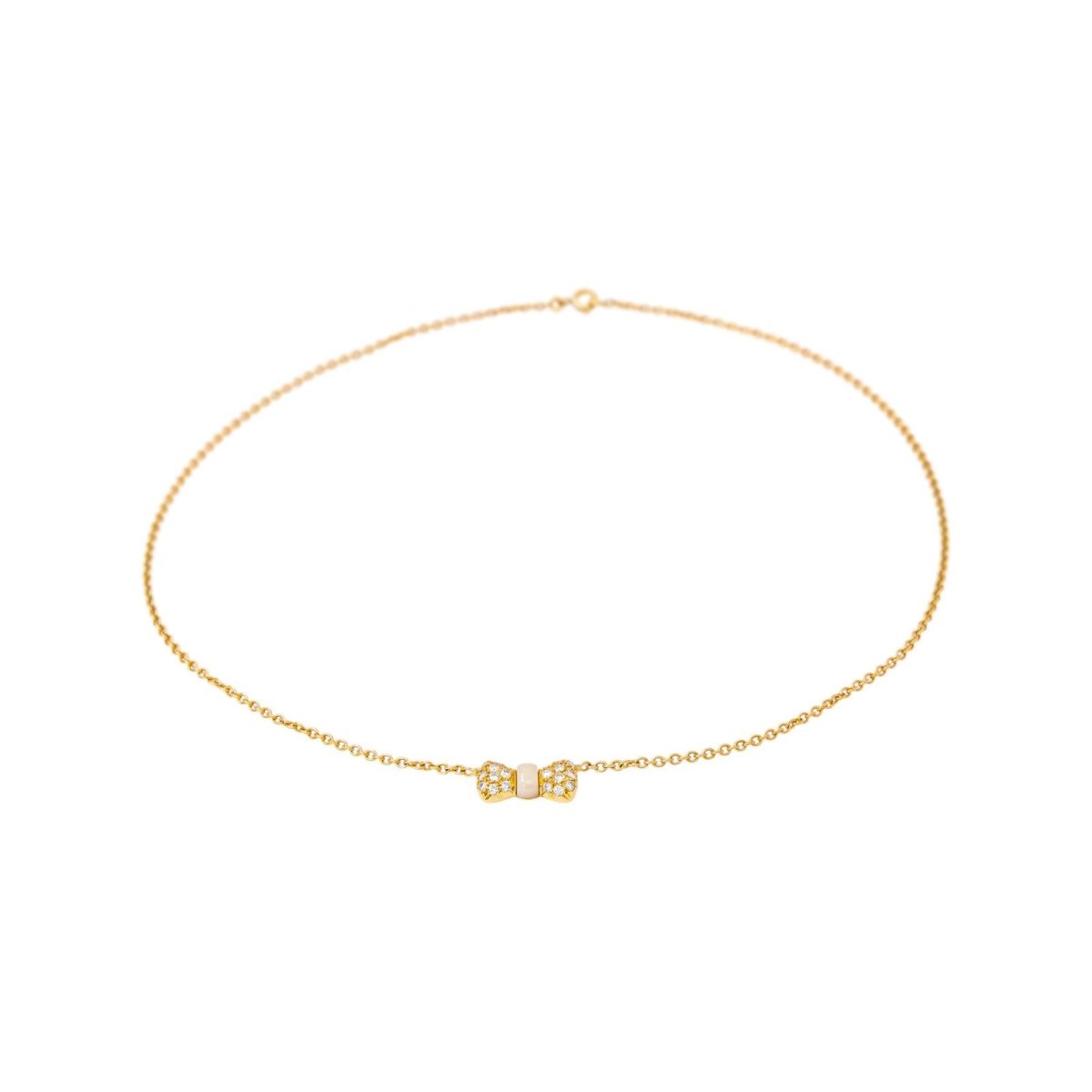 Collier Pendentif VAN CLEEF & ARPELS "Noeud" en or jaune, corail et diamants - Castafiore