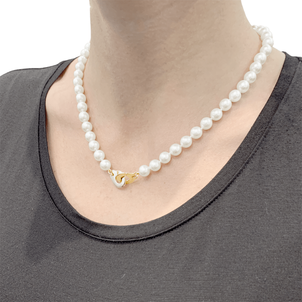 Collier Perles DINH VAN "Menottes R12" en or jaune et perles - Castafiore