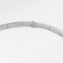 Collier rigide or gris de la maison Chaumet - Castafiore
