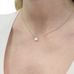 Collier solitaire deux ors, diamants. - Castafiore