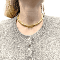 Collier, "Tubogas", or jaune. - Castafiore