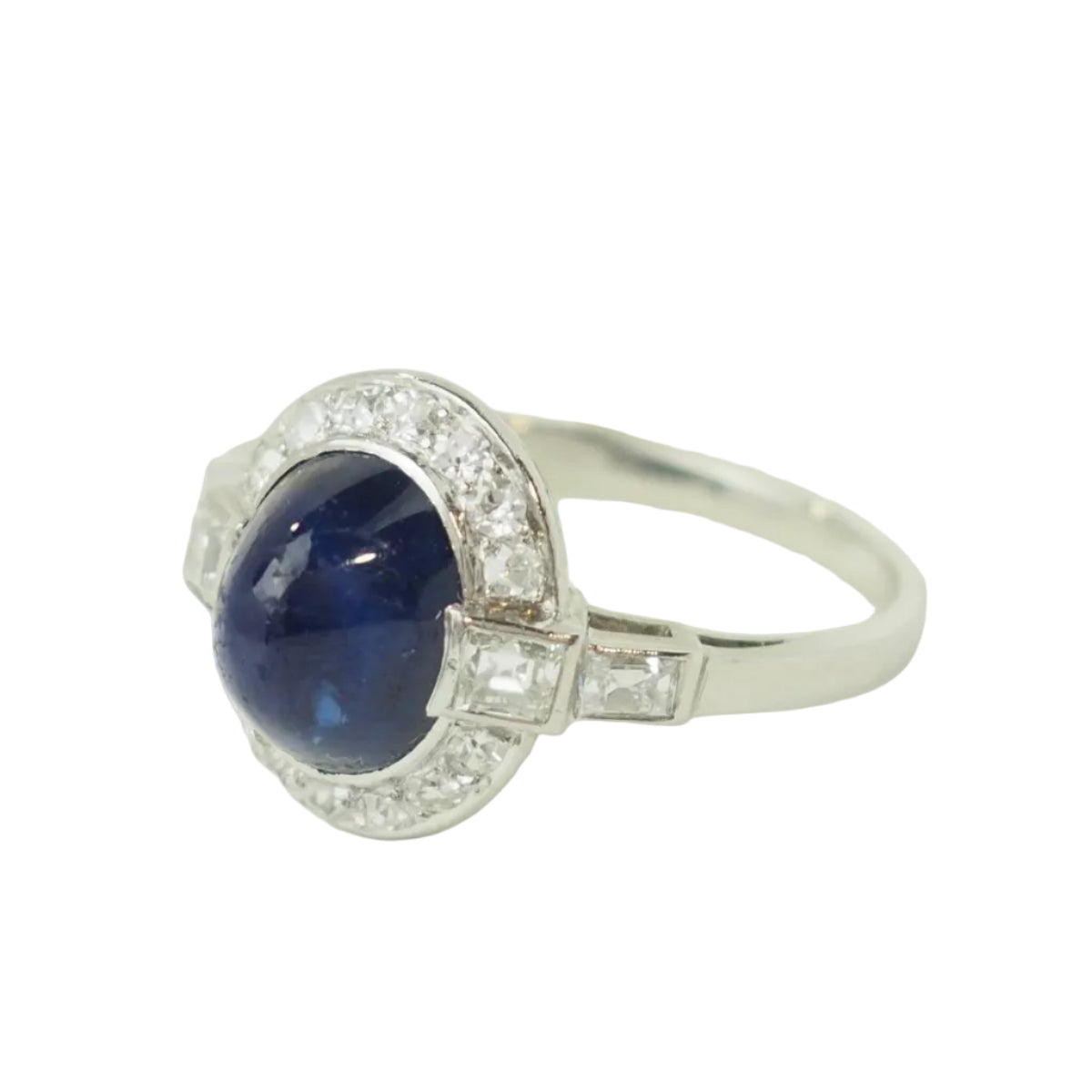 Bague Entourage en platine, saphir, et diamants
