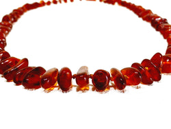 Collier En Perle d'Ambreflag