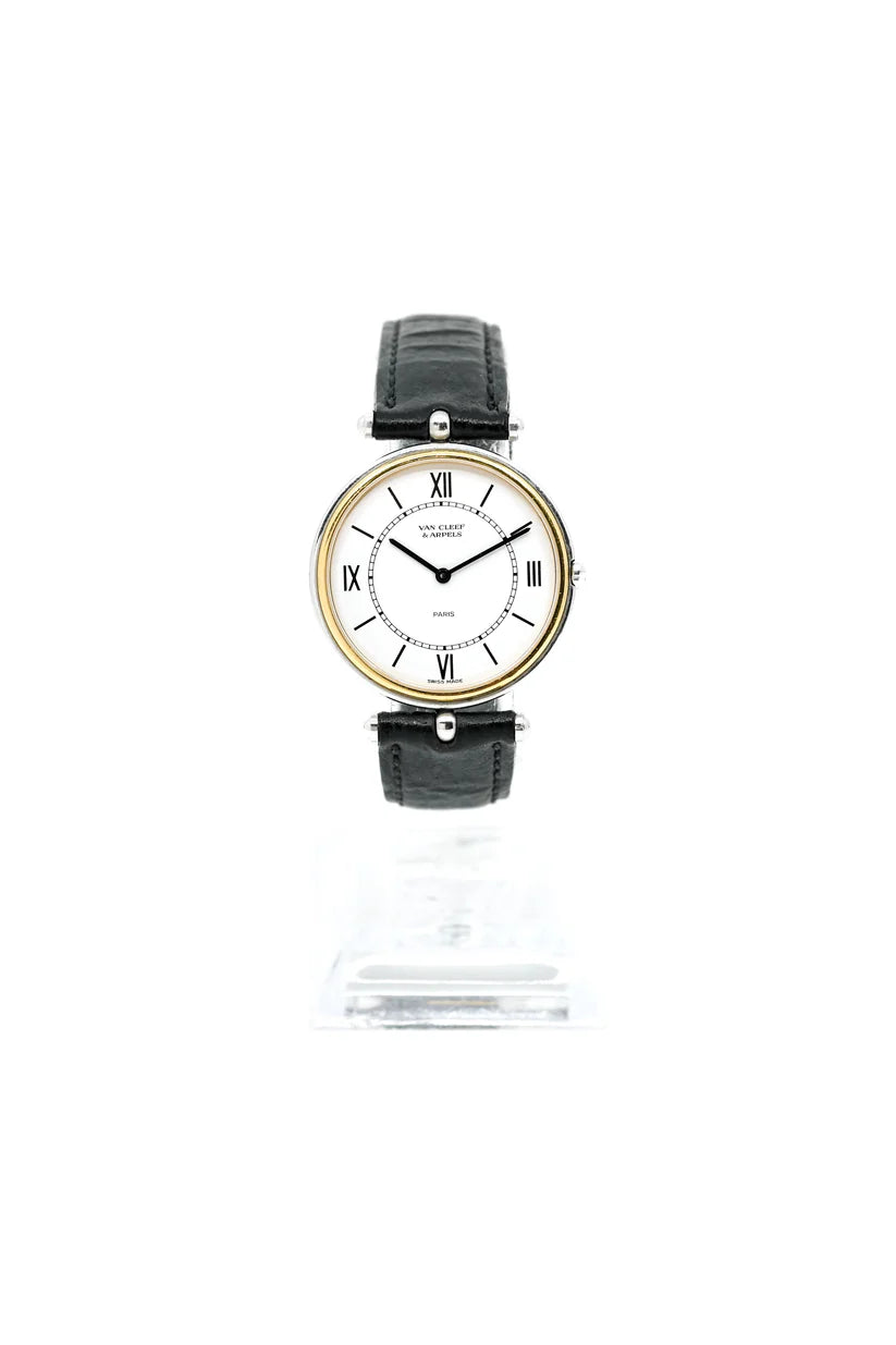 Montre VAN CLEEF & ARPELS PA 49 en or jaune, acier et cuir