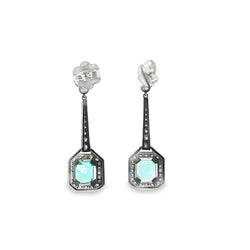 Boucles d'oreilles Pendantes en or blanc, émeraudes et diamants
