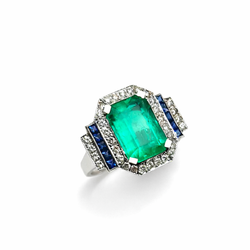 Bague Entourage en or blanc, émeraude, saphirs et diamants
