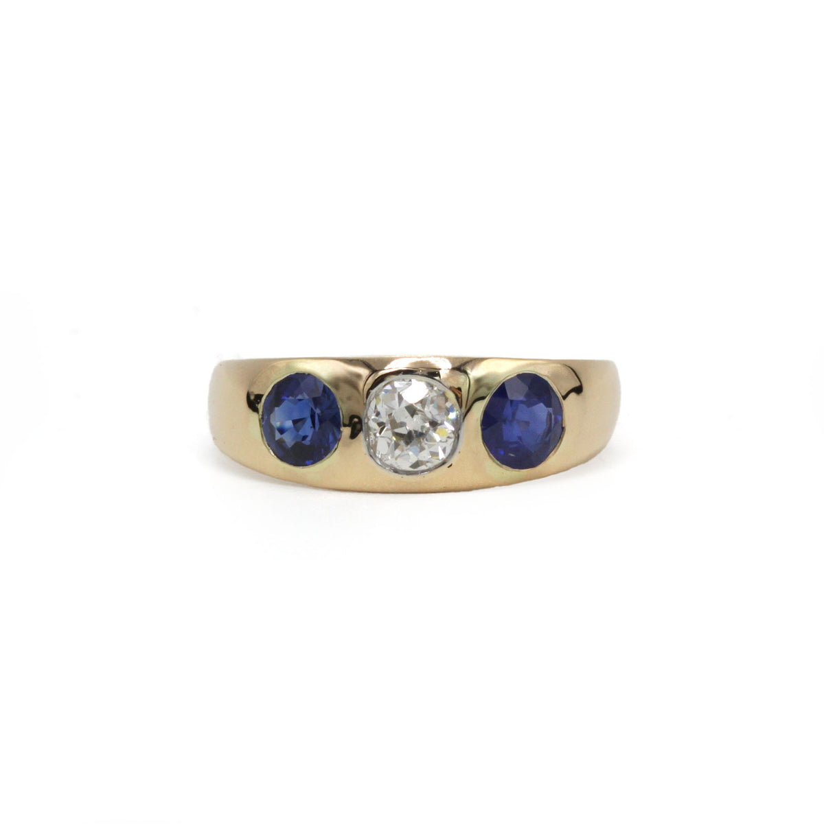 Bague Jonc en or jaune, saphirs et diamant