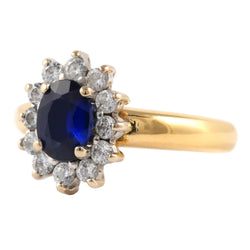 Bague Entourage en or jaune, saphir et zirconiums