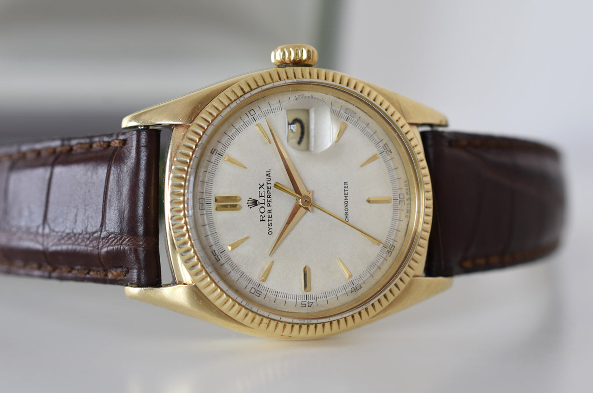 Montre ROLEX "Oyster Perpetual Date Ovettone" en or jaune et cuir