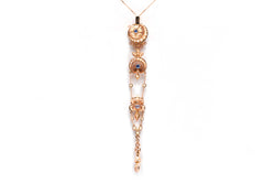 Pendentif en or jaune, perles et saphirs