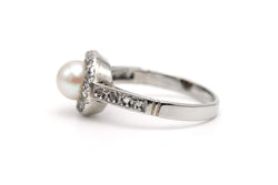 Bague Entourage en or blanc, perle et diamants