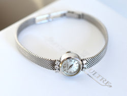 Montre JAEGER-LECOULTRE en or blanc et diamants