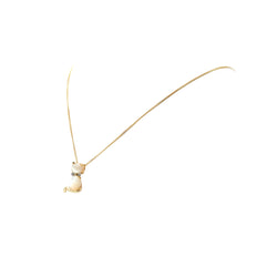 Pendentif en or jaune, nacre et diamants