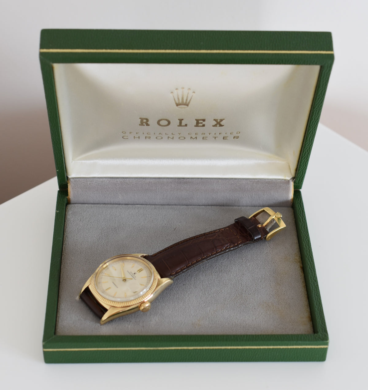 Montre ROLEX "Oyster Perpetual Date Ovettone" en or jaune et cuir