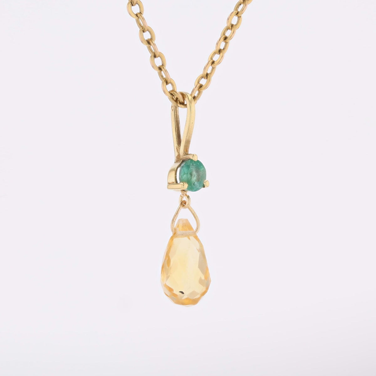 Pendentif en or jaune, émeraude et citrine