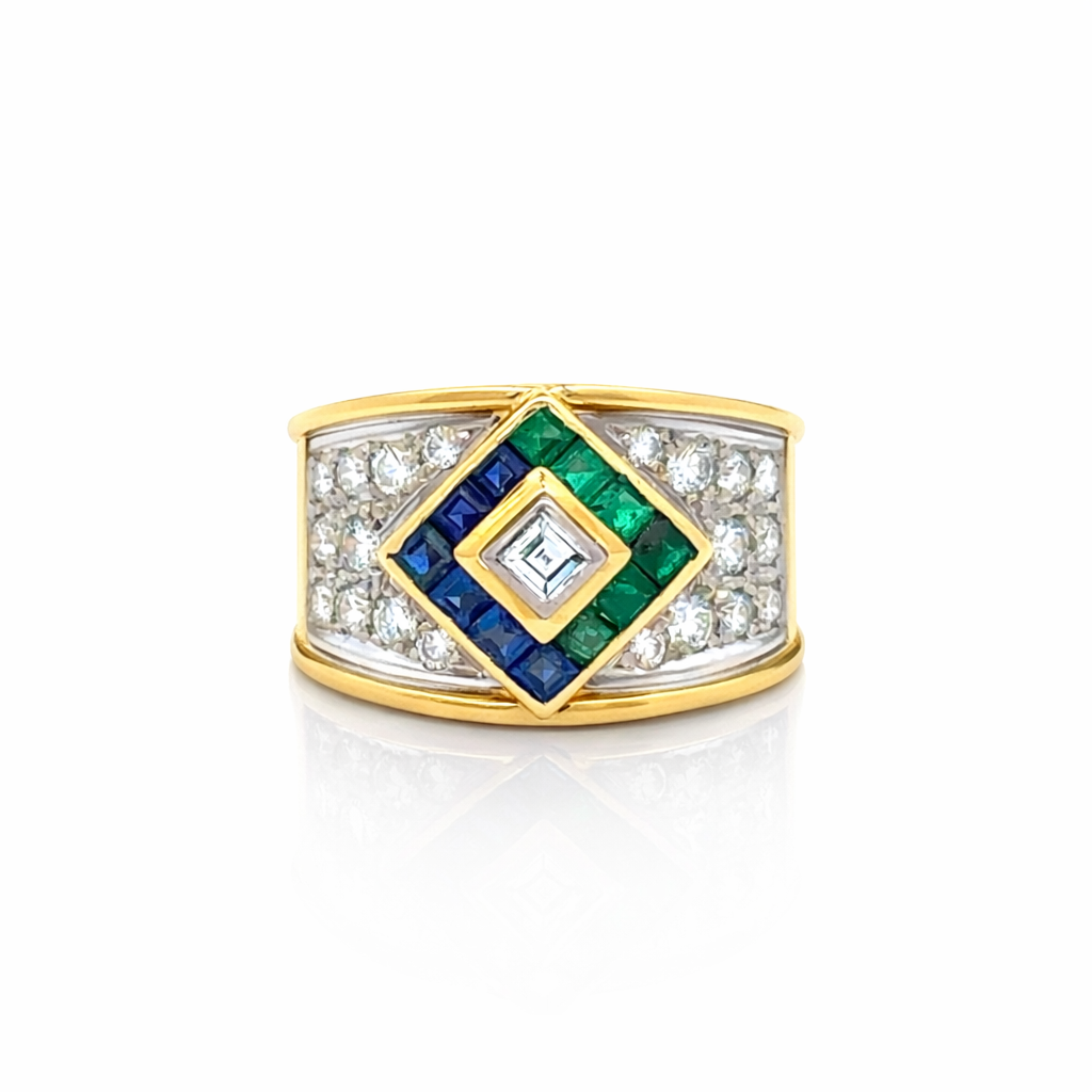Bague en or blanc, or jaune, saphirs, émeraudes et diamants