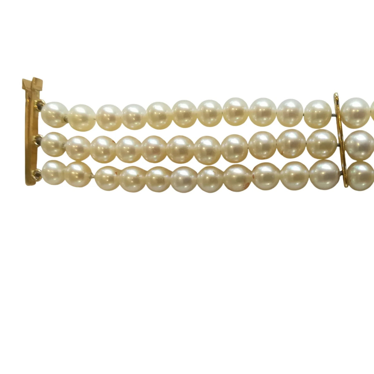 Bracelet en or jaune et perles