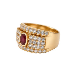 Bague Pavée en or jaune, rubis et diamants