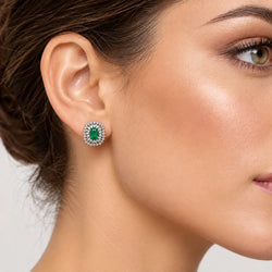 Boucles d'oreilles Clips en or blanc, émeraudes et diamants