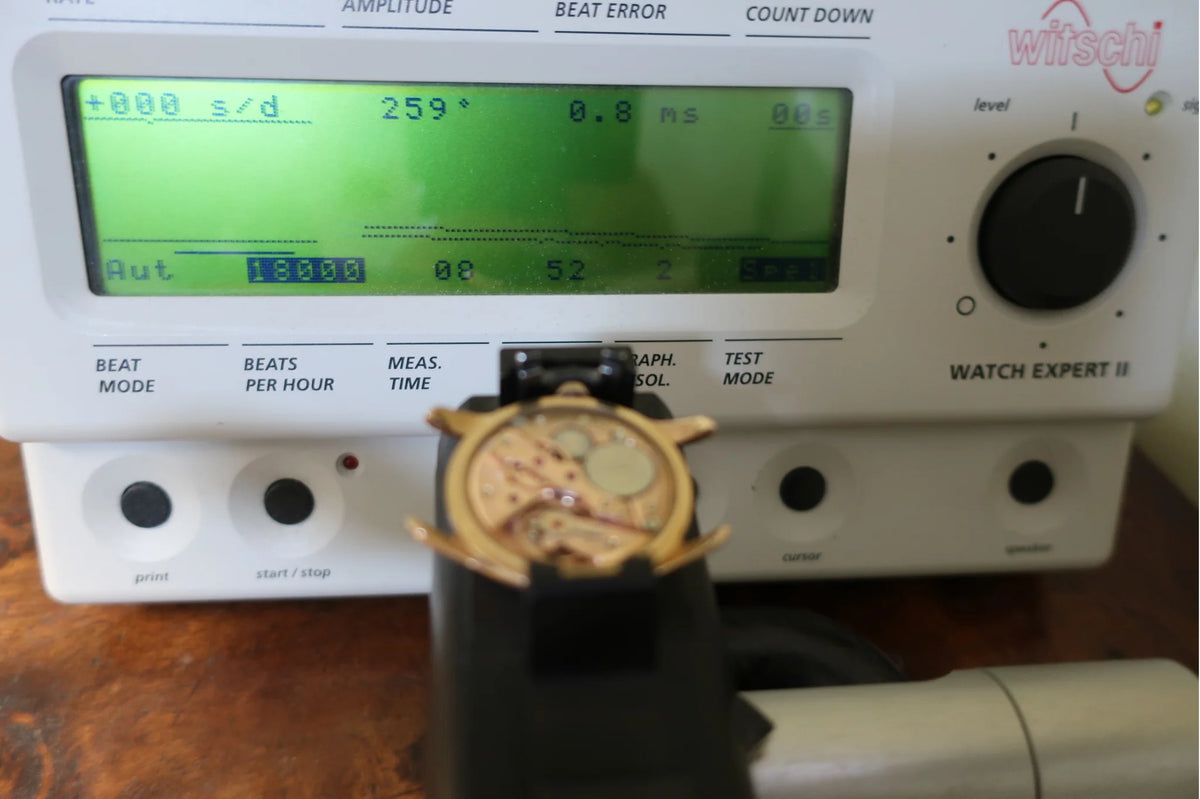 Montre OMÉGA en or jaune et cuir