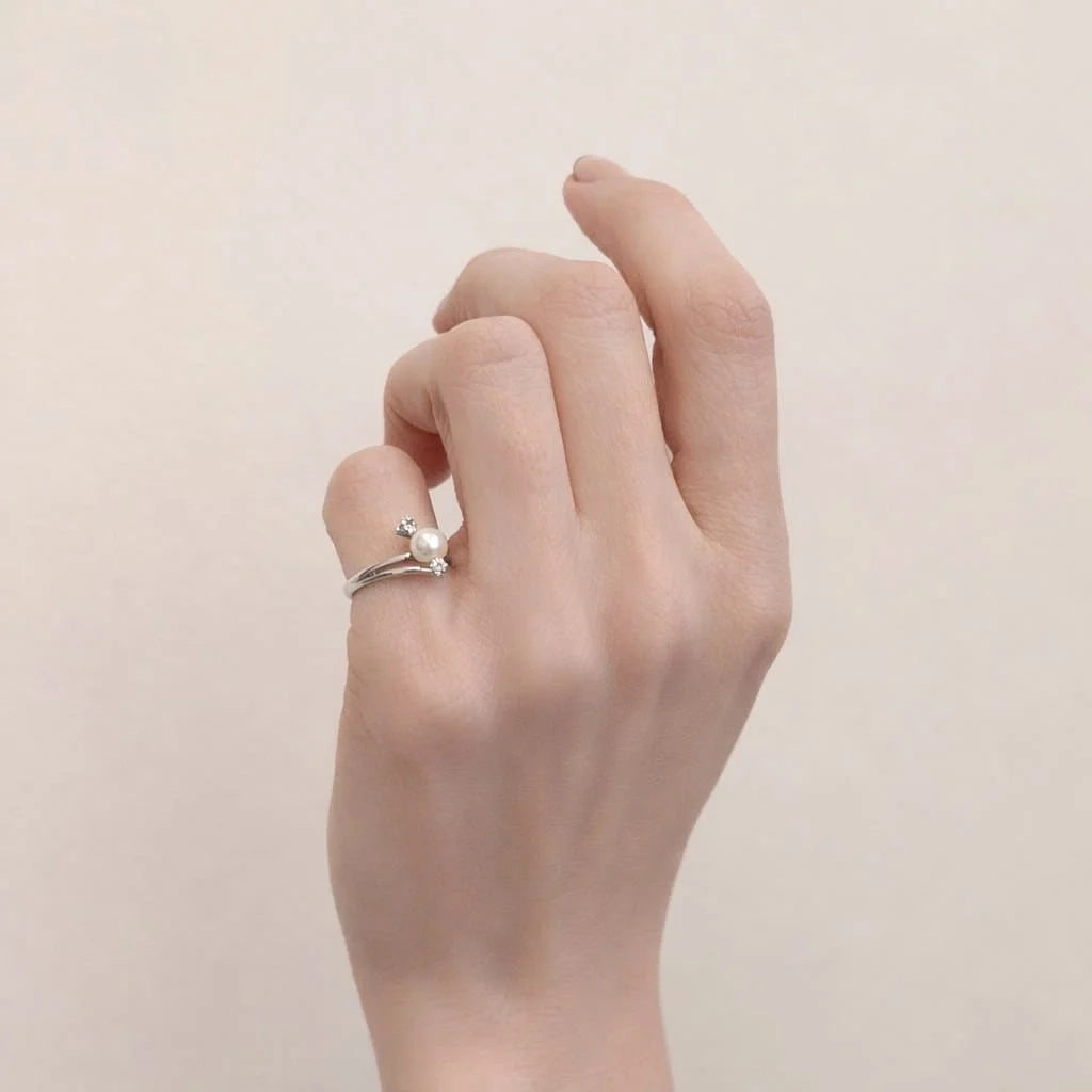 Bague Trilogie en or blanc, perle et diamants