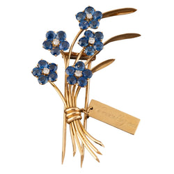 Broche Clip VAN CLEEF & ARPELS "Ne m'oubliez pas" en or jaune, saphirs et diamants