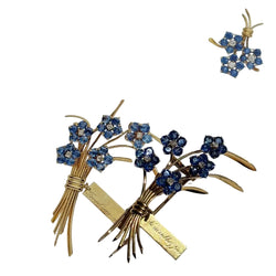Broche Clip VAN CLEEF & ARPELS "Ne m'oubliez pas" en or jaune, saphirs et diamants